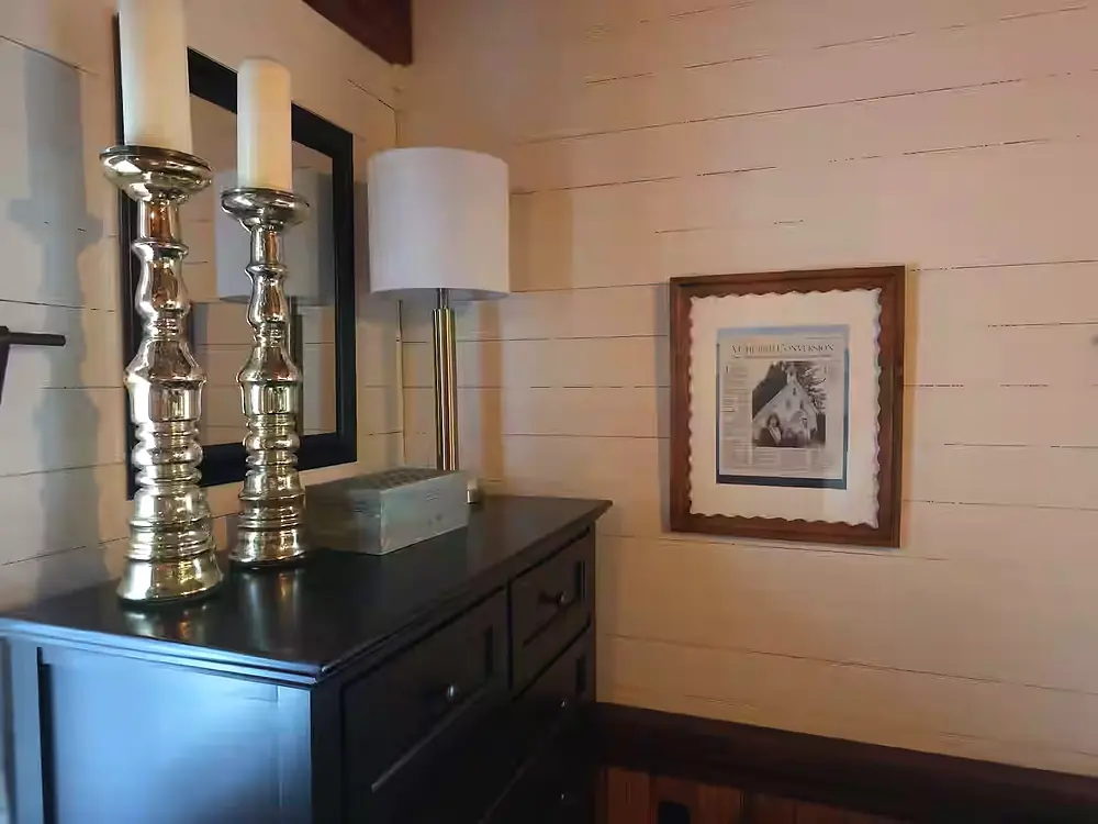 dresser with candles in the library